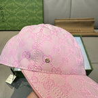 Pink monogram baseball cap with front emblem and adjustable strap