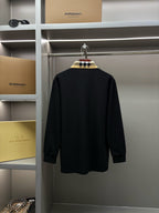 Burberry long-sleeve polo shirt back view, black with check collar