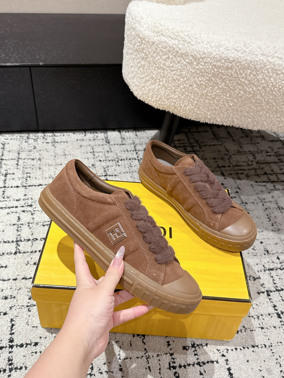 Brown suede Fendi sneakers, side view with stitched logo details