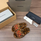 Balenciaga leopard-print faux-fur slide sandals with red embroidered strap, front view
