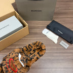 Balenciaga leopard-print faux-fur slide sandals, angled pair view with white lining