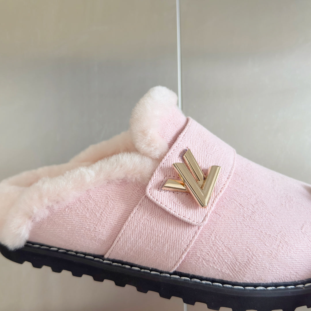 Pink plush slide sandal with gold V logo front strap and dark rubber sole