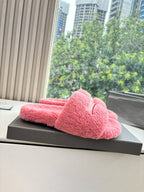 Balenciaga fuzzy pink slide sandals with wide strap, side profile on display box