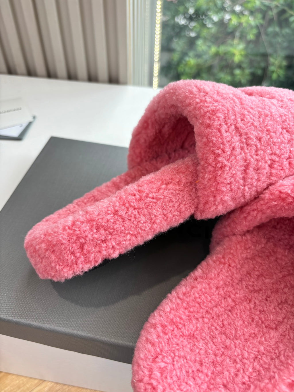 Balenciaga pink plush slide sandals with curled padded strap and open toe