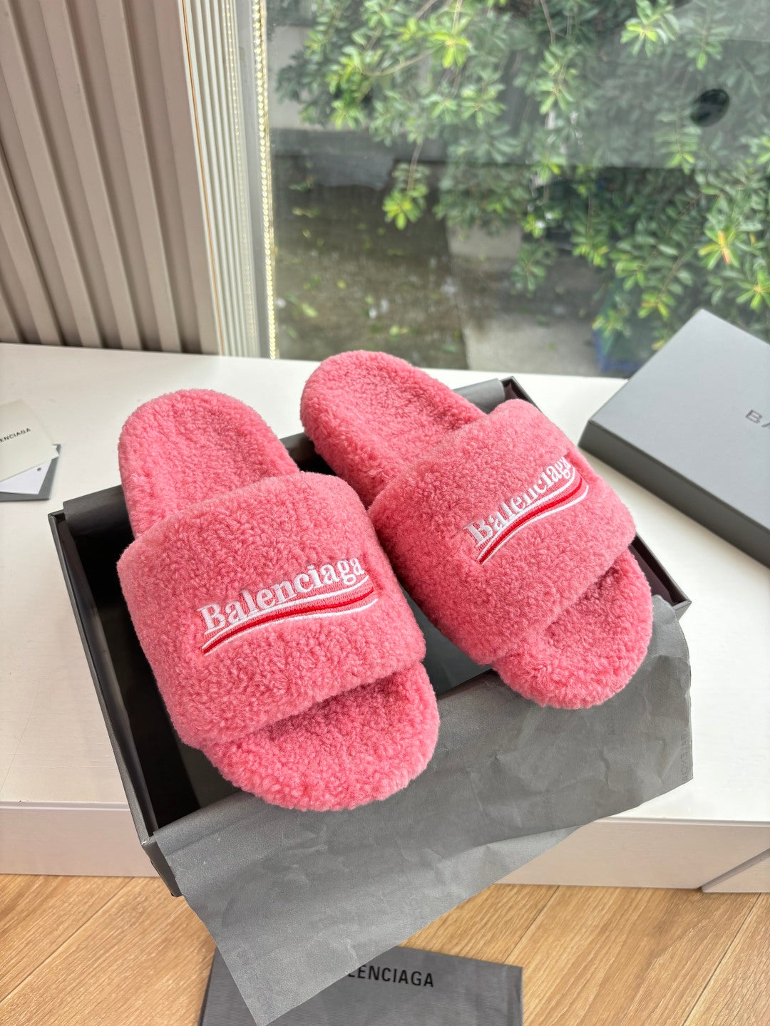 Balenciaga fuzzy pink slide sandals with wide logo strap, pair on box