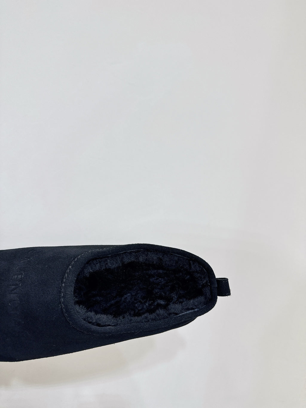 Balenciaga suede slip-on sandals in dark navy, close-up of inner lining