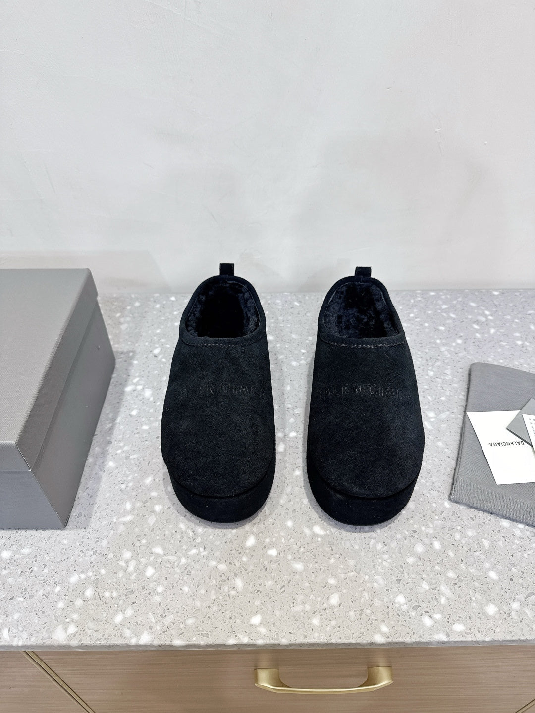 Balenciaga suede slip-on sandals in dark navy, pair front view