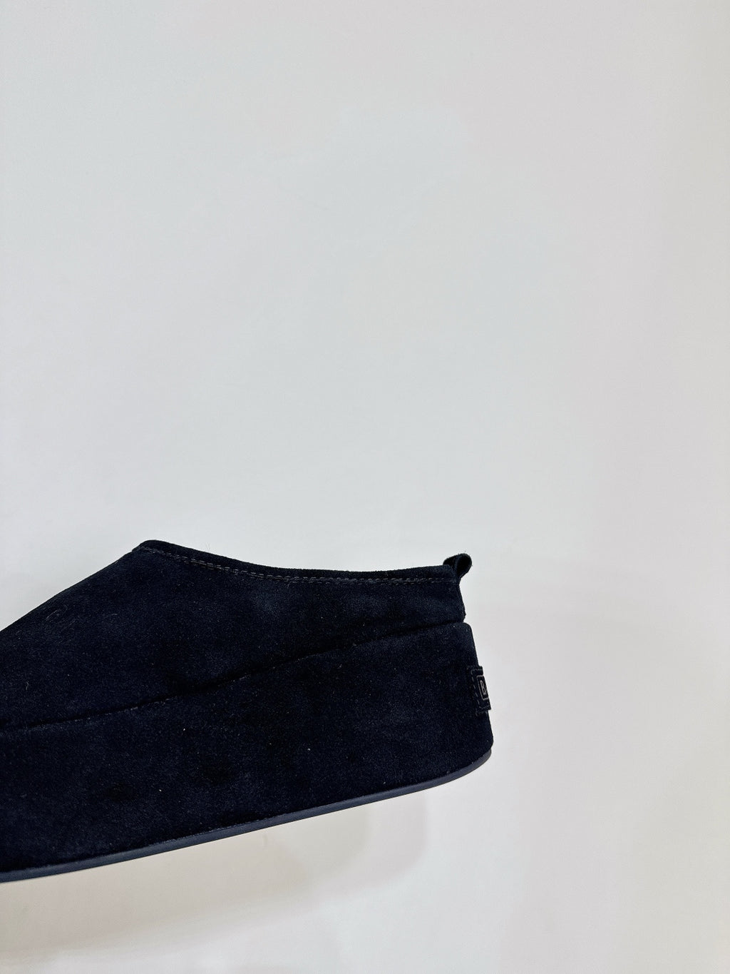 Dark blue suede slide sandal upper with small back bow