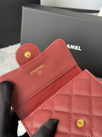 CHANEL small bag with open flap, red textured leather, gold snap button, interior pocket