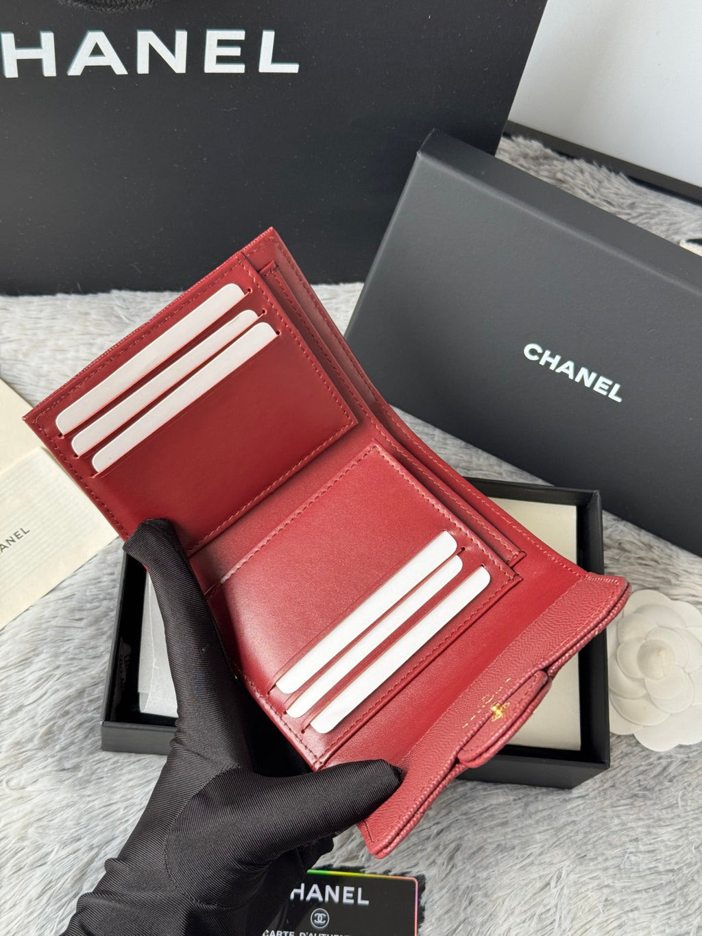 Small red wallet bag open view with card slots inside