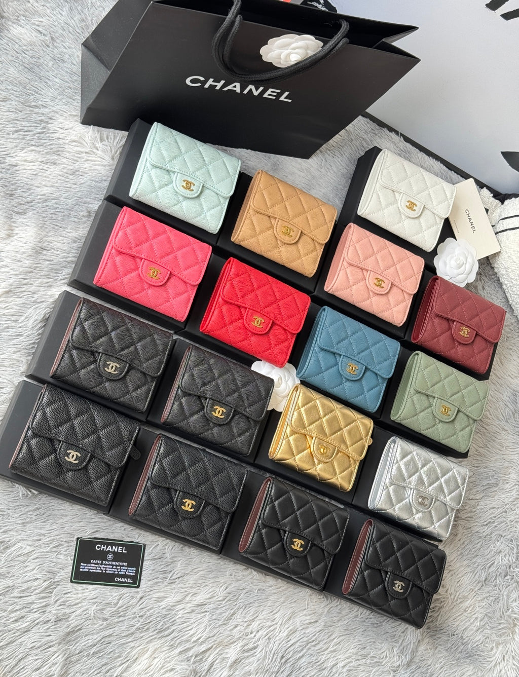 Assorted quilted mini flap bags with gold clasps in bright and neutral colors