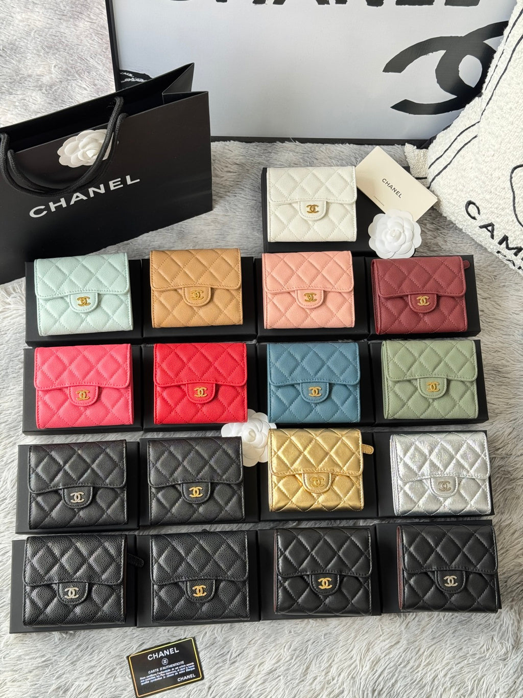 Set of quilted mini flap bags with gold clasp detail in mixed pastel and dark