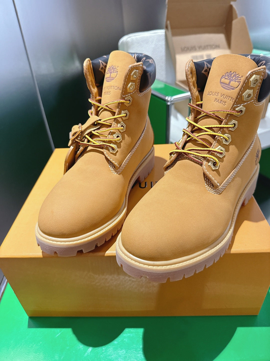 Louis Vuitton unisex lace-up boots, tan suede with yellow laces and logo straps