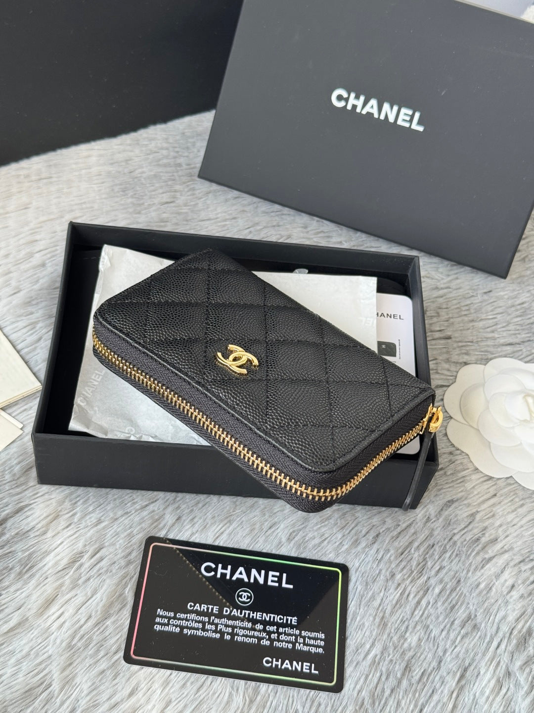 Quilted small bag with gold-tone zipper, CC turn-lock logo, and chain strap