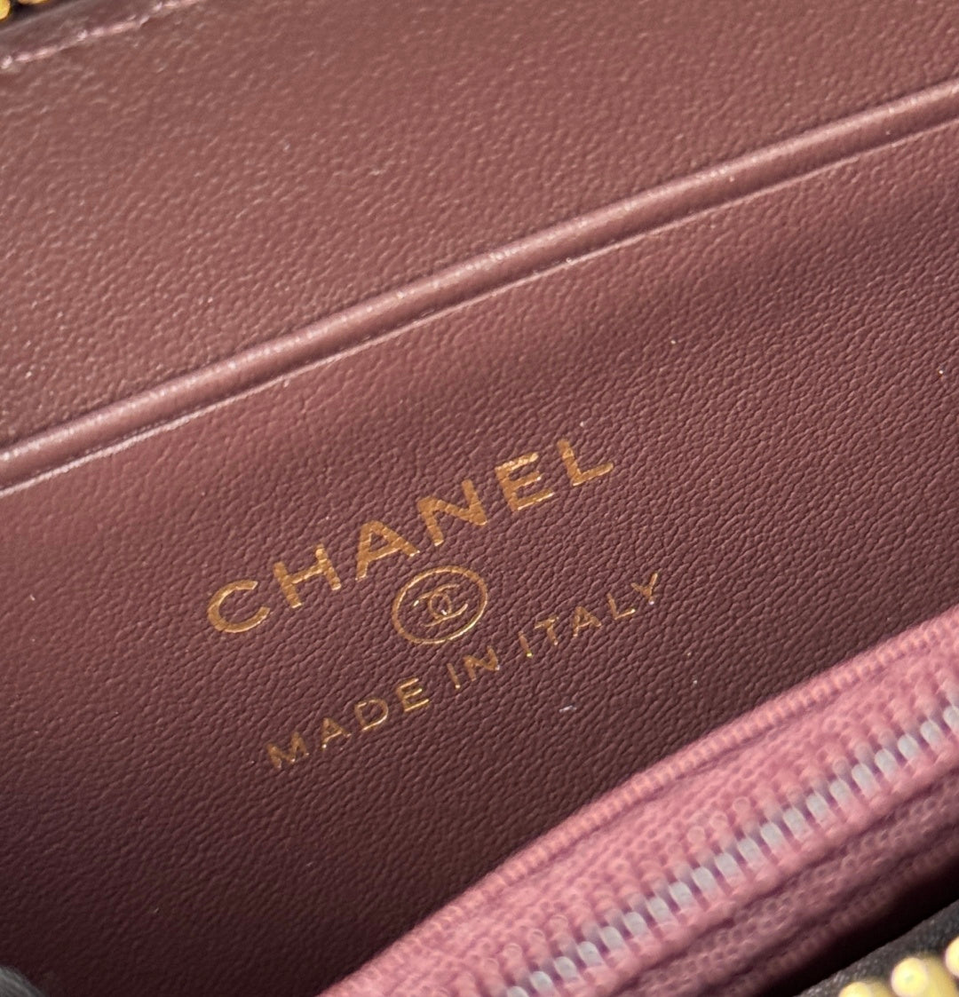 Burgundy leather panel with Chanel logo and 'MADE IN FRANCE' text