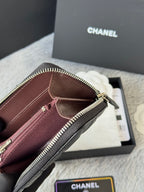 Small bag: burgundy-lined zip wallet pouch interior, gold zipper and clasp