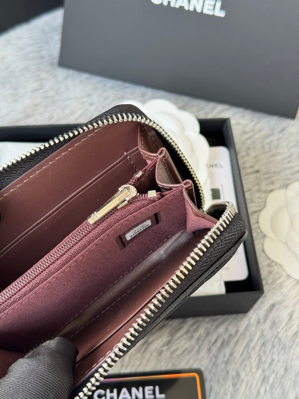 Small bag wallet with zipper, gold hardware, maroon interior and card slots
