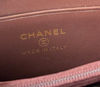 Embossed Chanel logo on brown leather wallet lining