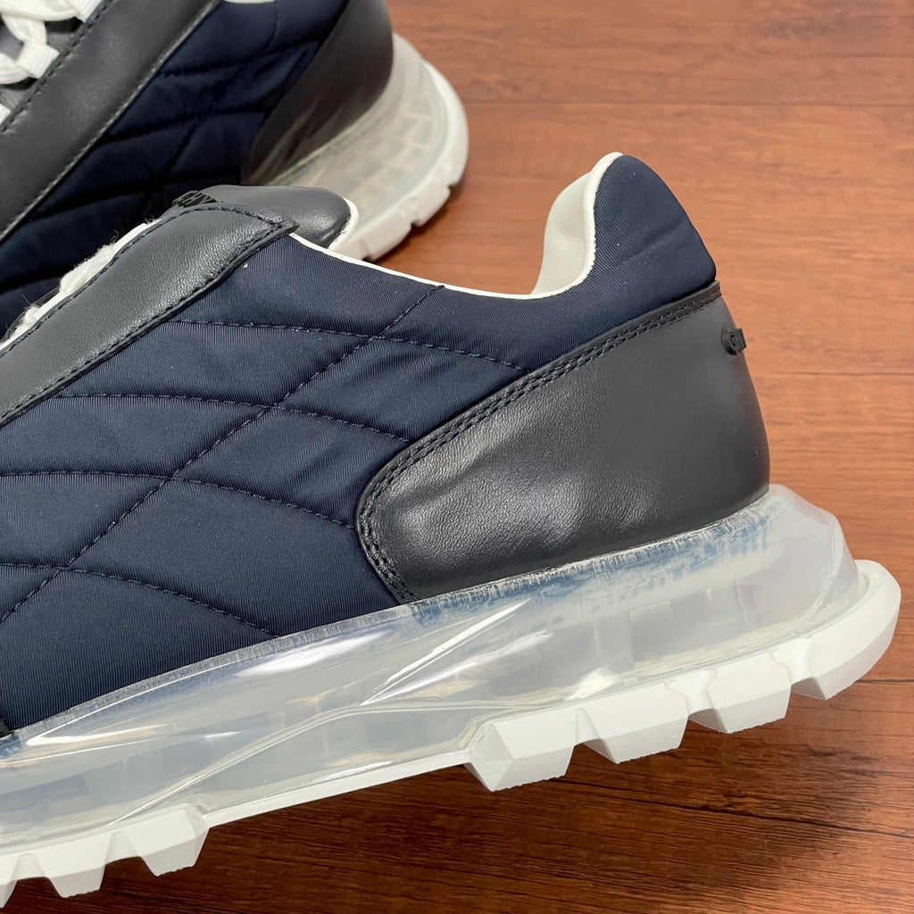 Givenchy navy leather sneaker with quilted panel, black toe cap, and clear sole