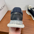 Givenchy navy sneakers heel with brand tab and clear sole tread