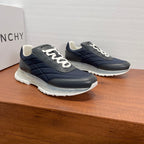Givenchy quilted navy sneakers with white laces and thick white rubber sole