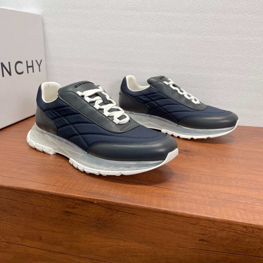 Givenchy quilted navy sneakers with white laces and thick white rubber sole