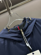 Navy hooded vest fabric with front zipper and metal pull tabs