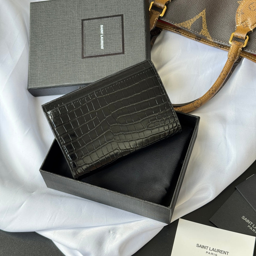 Small bag with front flap, black croc-embossed leather texture and smooth back panel