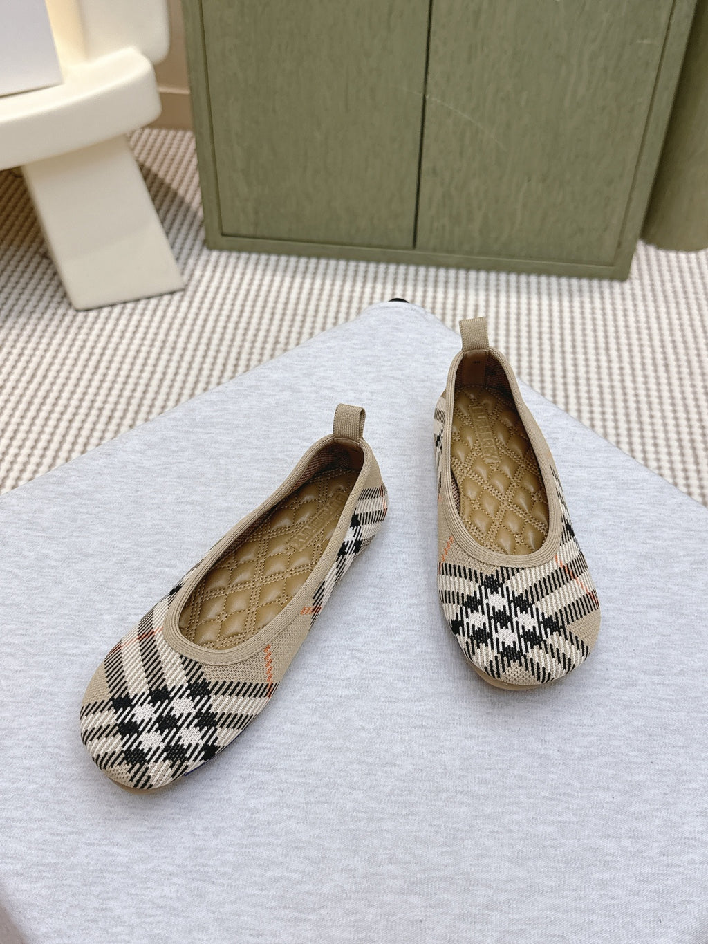 Plaid slip-on shoes, toe and heel view showing tan quilted lining