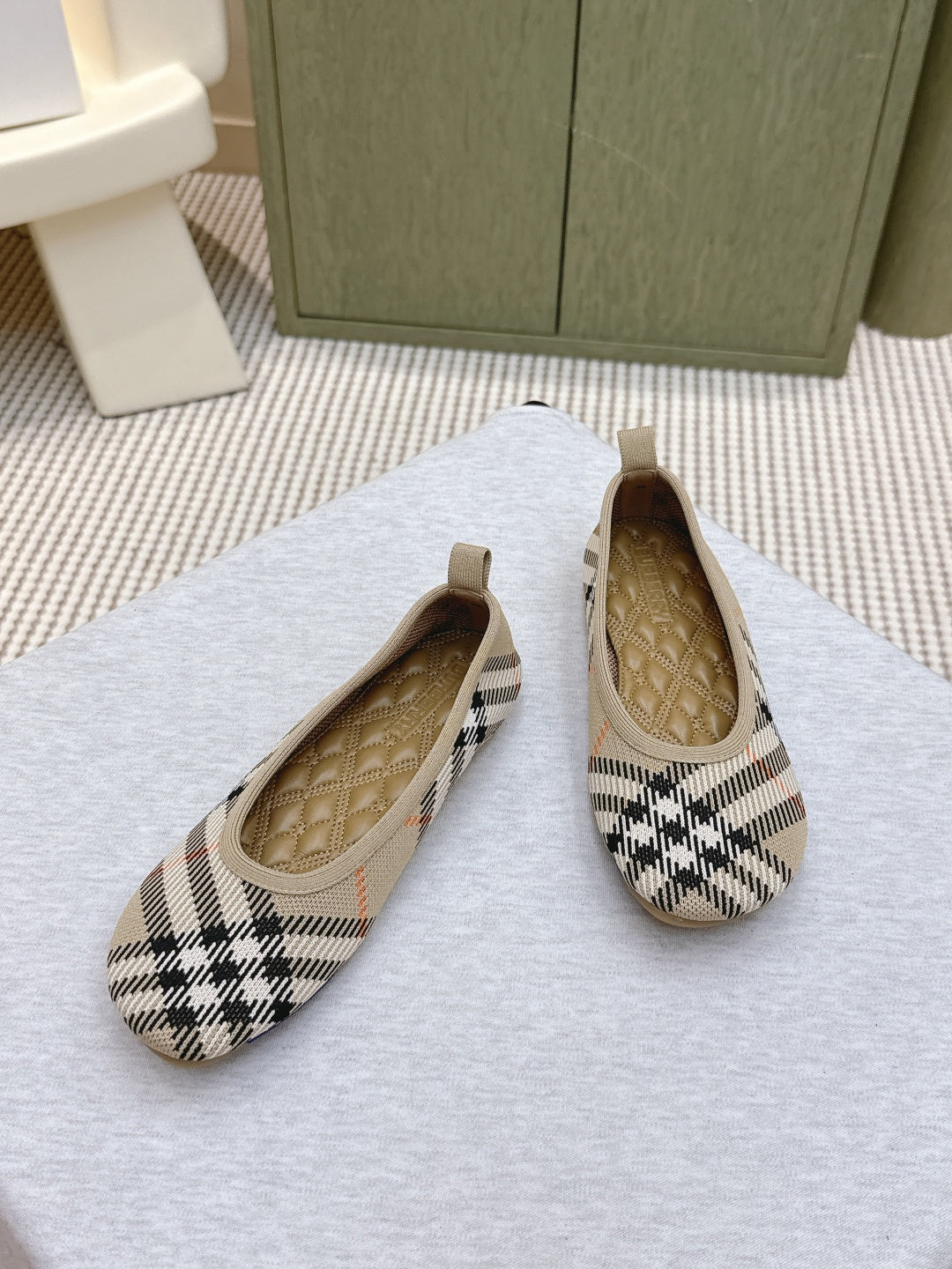 Plaid slip-on shoes, toe and heel view showing tan quilted lining
