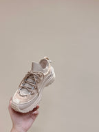 Moncler light beige sneaker held up, lace-up front and cushioned collar