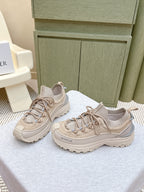 Moncler light beige sneakers, side view with textured upper and lace-up closure