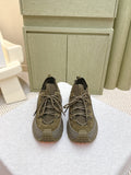 Moncler olive running sneaker with lace-up front and rubber lug sole