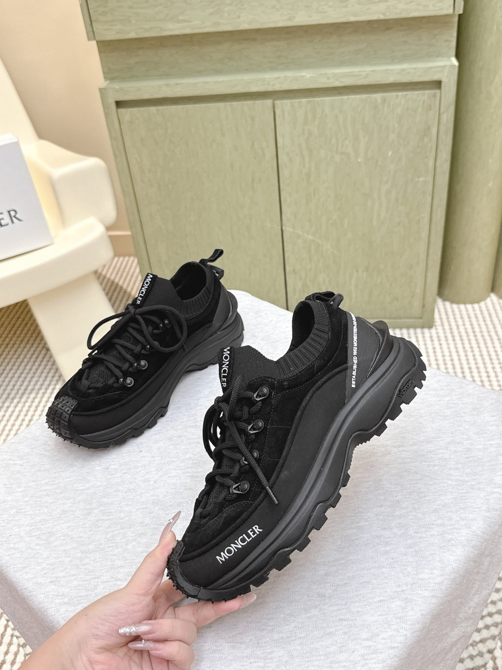 Black Moncler lace-up sneaker with side logo, chunky rubber sole
