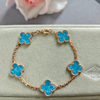 Van Cleef & Arpels clover charm bracelet, blue enamel on rose-gold tone chain
