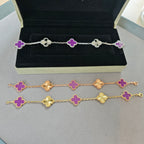 Van Cleef & Arpels clover charm bracelet, silver with purple enamel clovers laid in box
