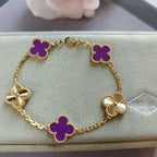 Van Cleef & Arpels clover charm bracelet, gold chain with purple enamel clovers