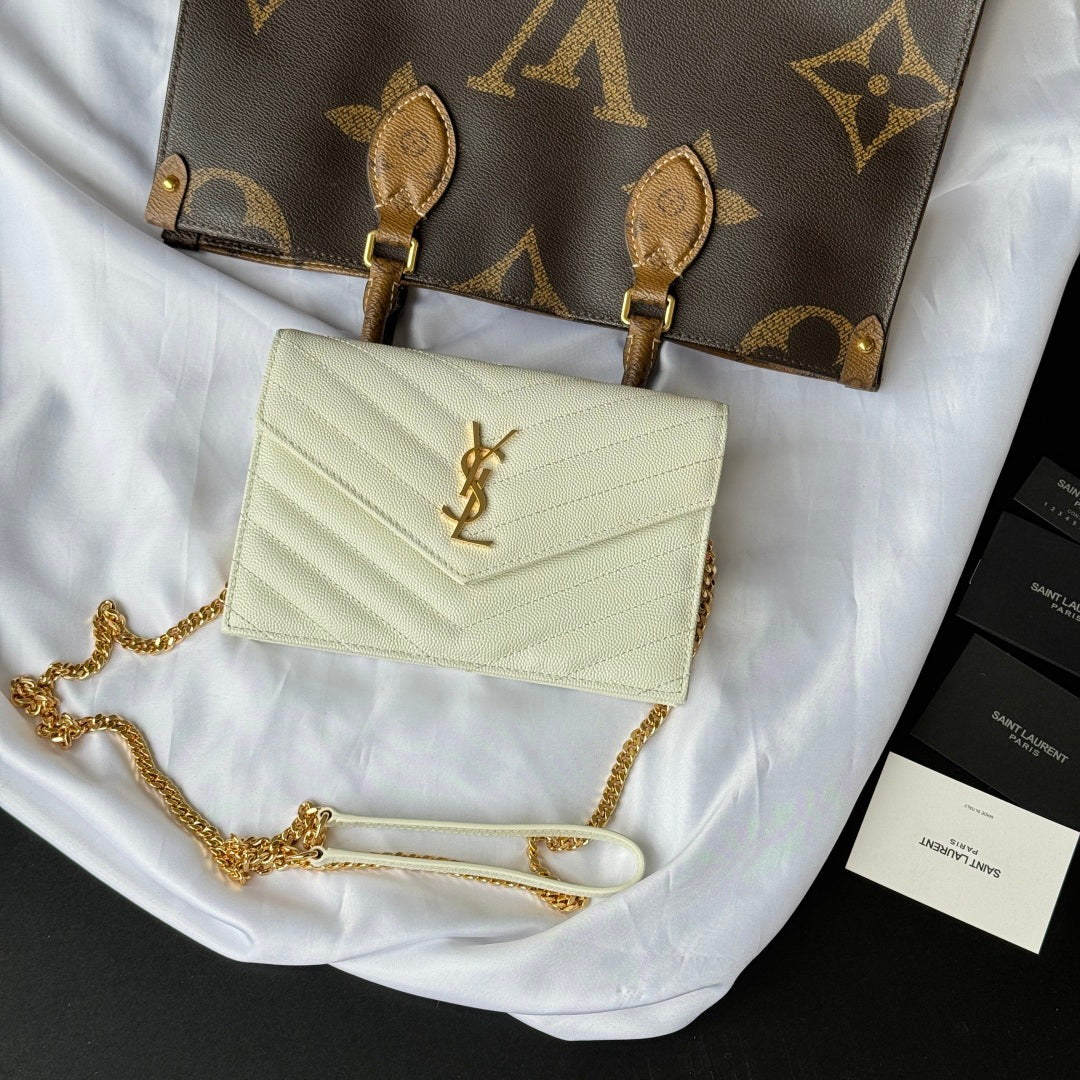 Cream YSL small quilted shoulder bag with flap and gold chain strap