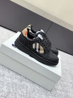 Burberry black sneakers with check-panel side stripe, textured sole, lace-up