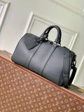 Men's Louis Vuitton duffel bag in dark gray leather, top handles and detachable strap.