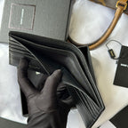 Black textured wallet bag with multiple card slots and zipper pocket