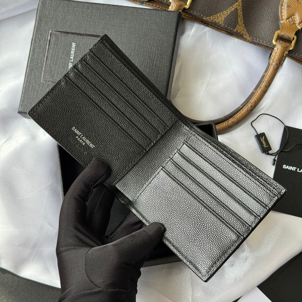 Black textured wallet bag with card slots and long strap