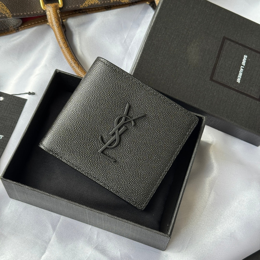 Small textured leather card holder wallet with YSL logo, front view in gray box