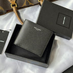 Small bag with textured dark leather surface, front logo and top flap detail