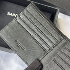 Small bag interior showing several card slots in textured leather