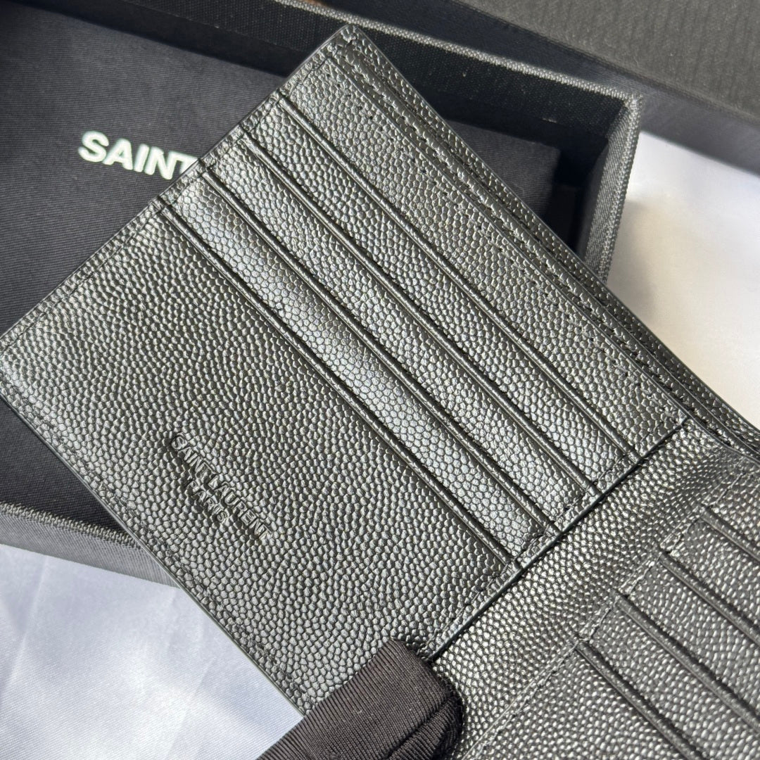 Small bag interior showing several card slots in textured leather