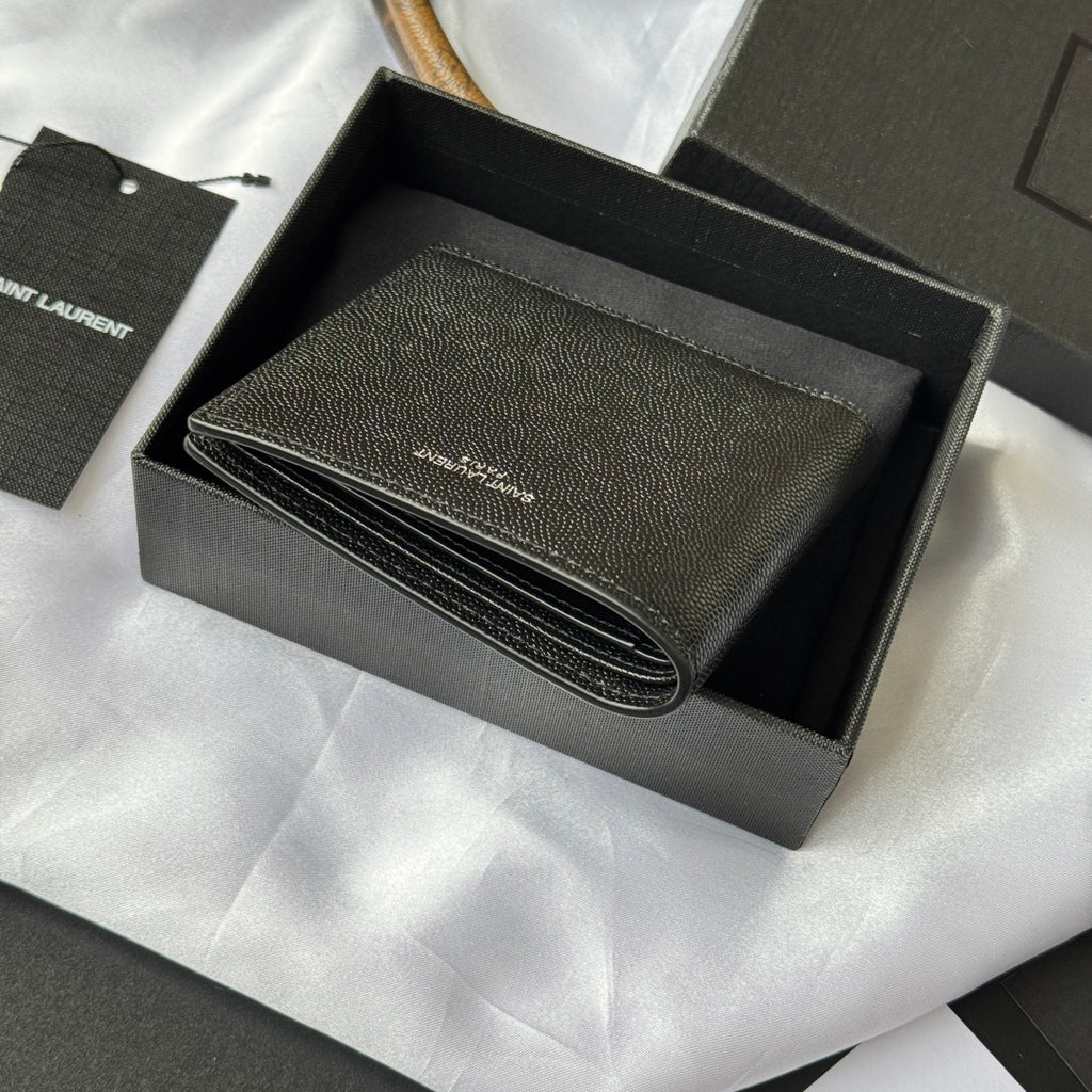 Small bag open view with dark leather card slots and stitched edge