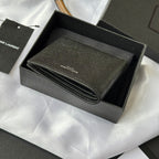 Small bag open view with dark leather card slots and stitched edge