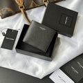 Small bag with textured dark leather exterior, flap closure, Saint Laurent Paris logo
