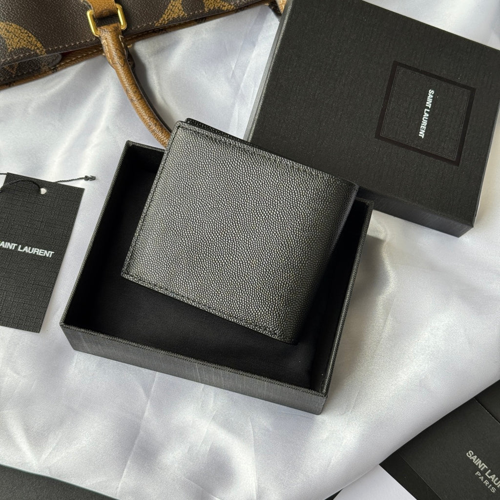 Small bag in textured dark leather with stitched flap and Saint Laurent Paris logo
